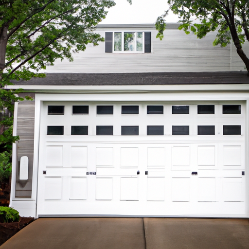 Suburban Westfield driveway with a modern closed garage door on a two-car home, overcast light, no people.